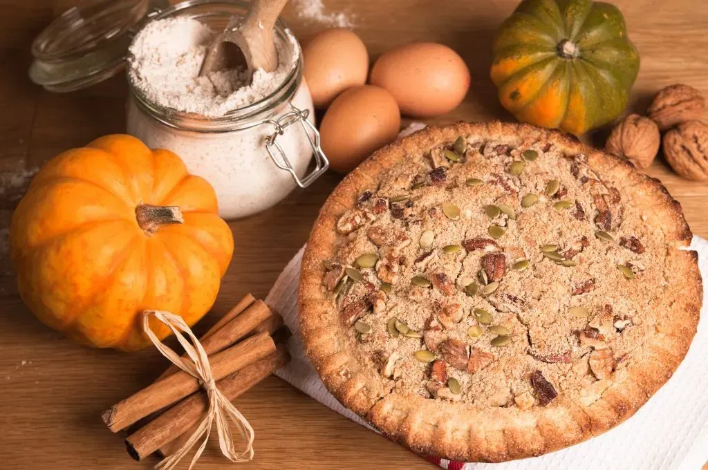 A freshly baked pie and trappings of Fall. 