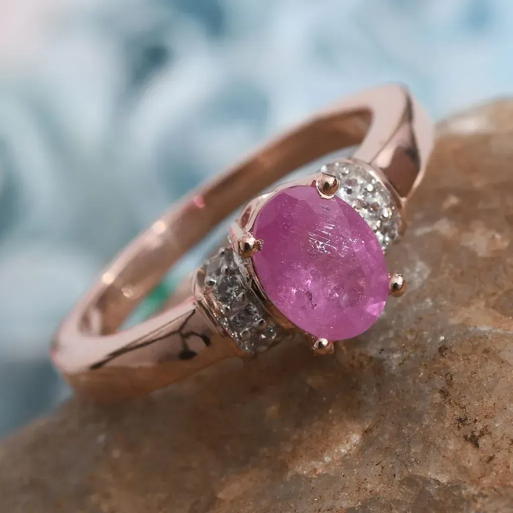 Hot pink sapphire ring in gold.