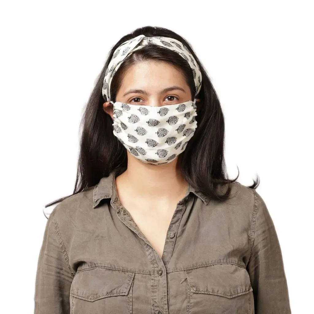 Ivory knotted headband and matching face mask. 
