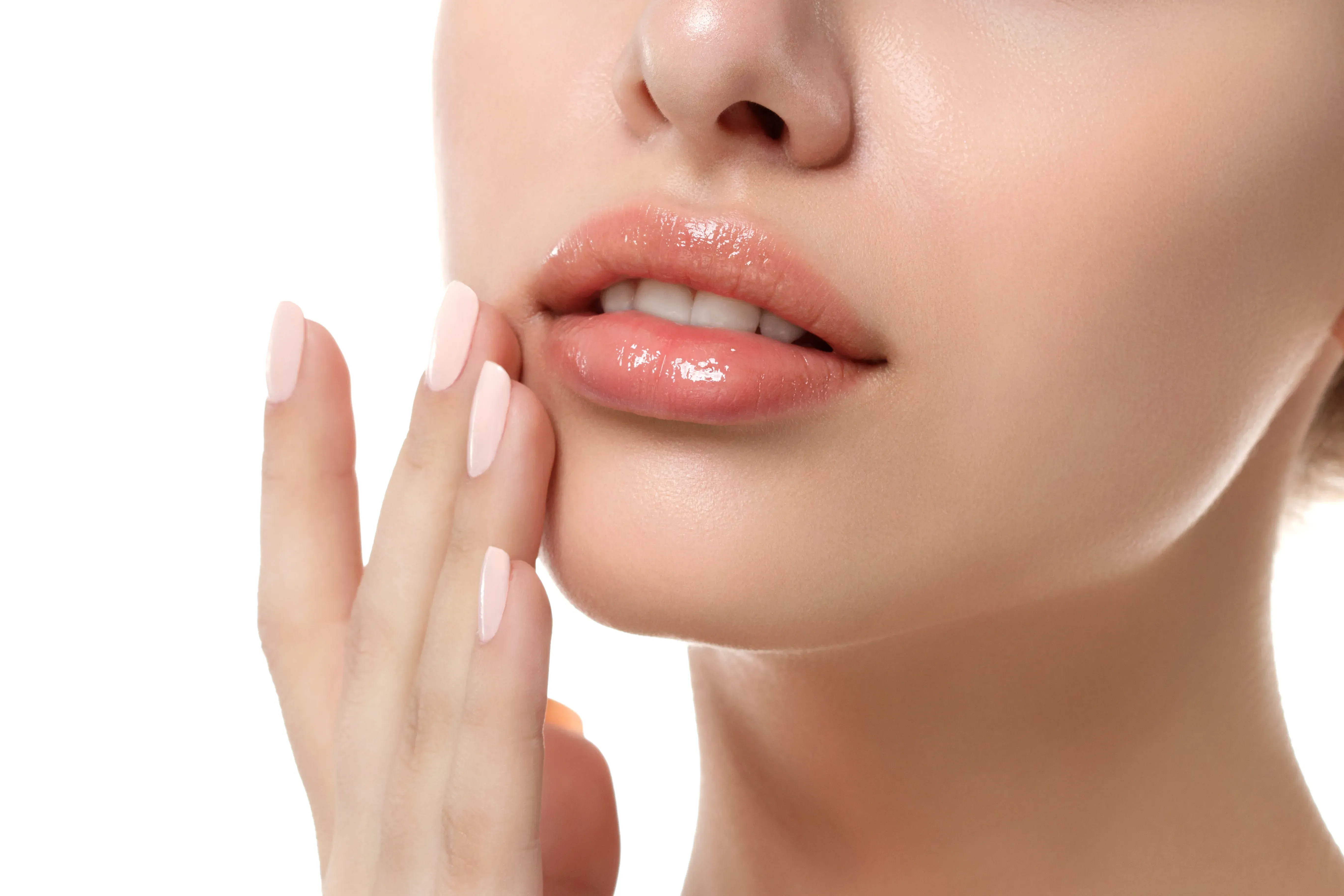 Woman exfoliating her lips. 