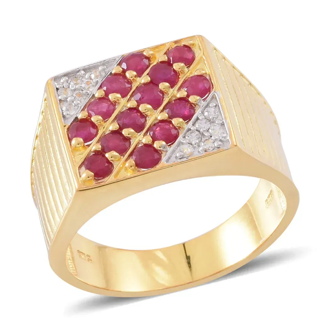 Gold ruby ring with zircon accents. 