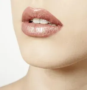 Closeup of woman with metallic lipstick.