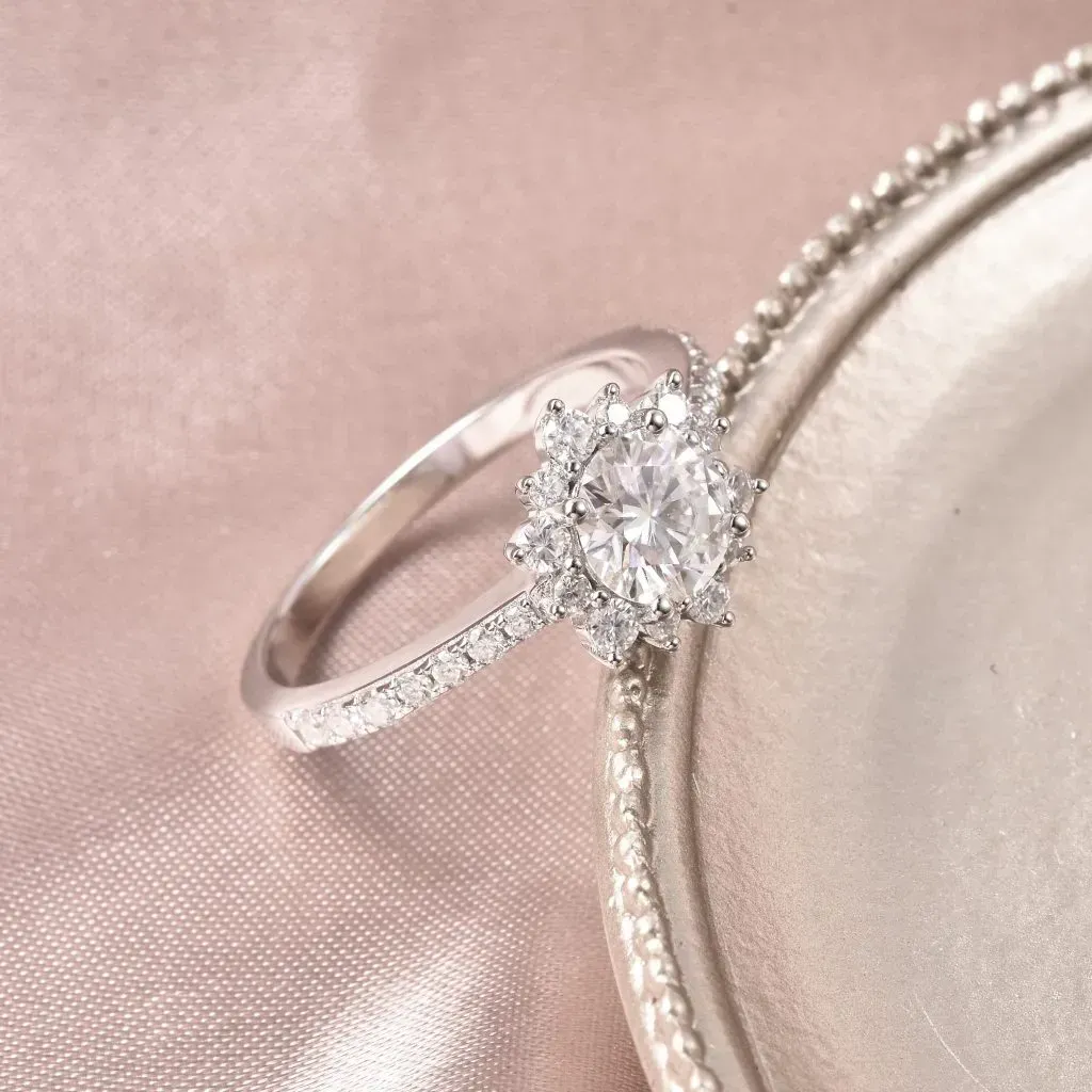 Moissanite halo ring in sterling silver. 