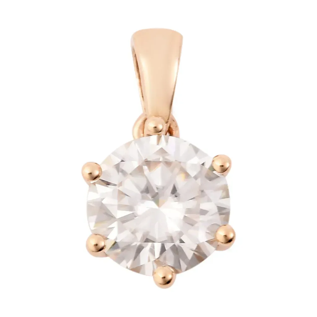 Gold moissanite pendant.
