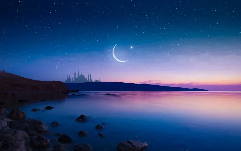 Artistic vision of the night sky over a serene lake, with a crescent moon overhead.
