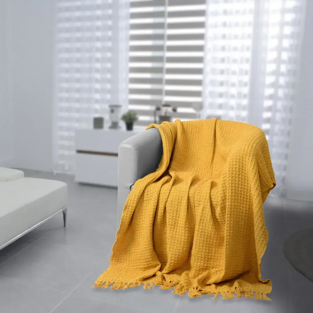 Yellow throw blanket. 