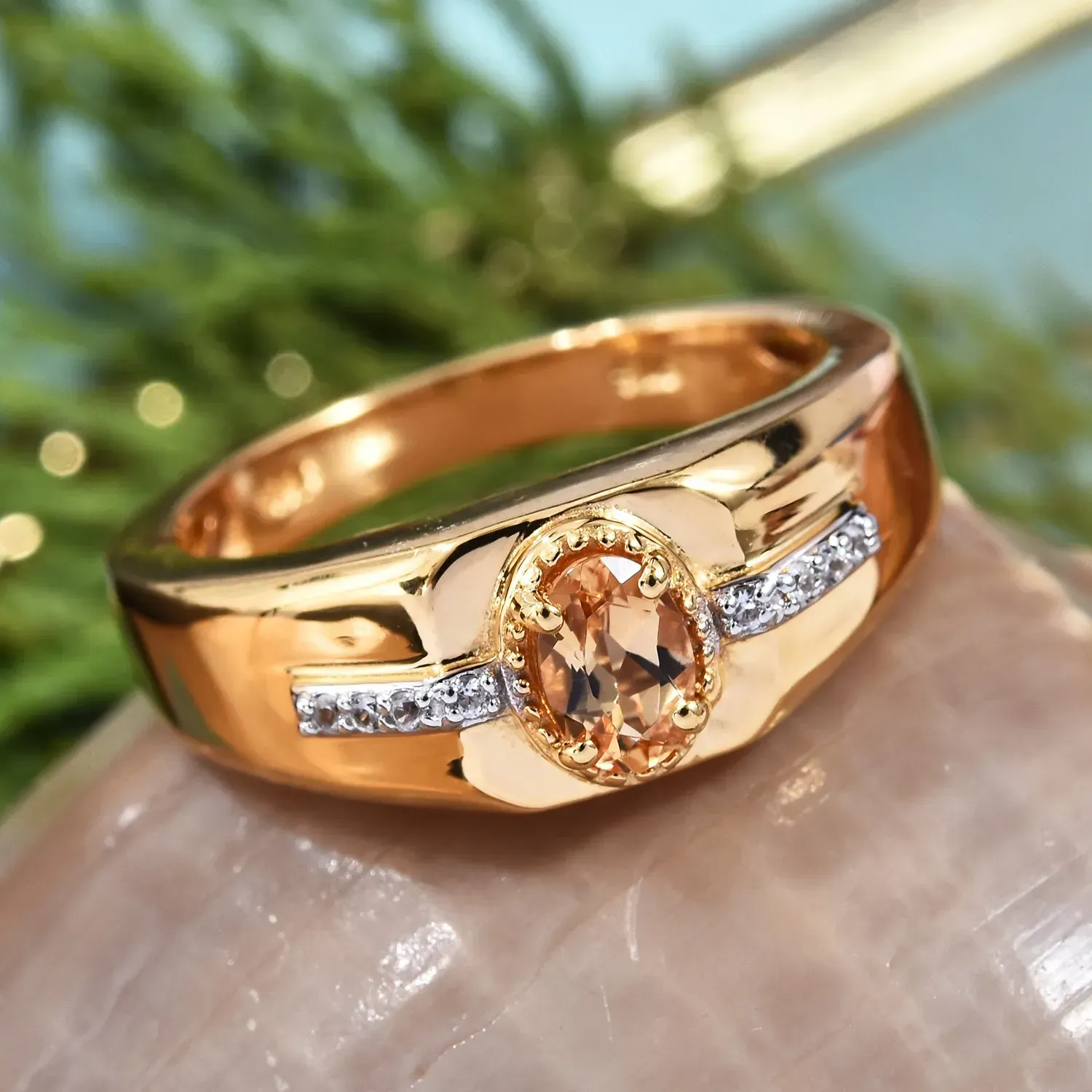 Gold men's ring featuring imperial topaz. 