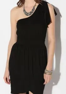 Woman wearing necklace paired with over-the-shoulder top.
