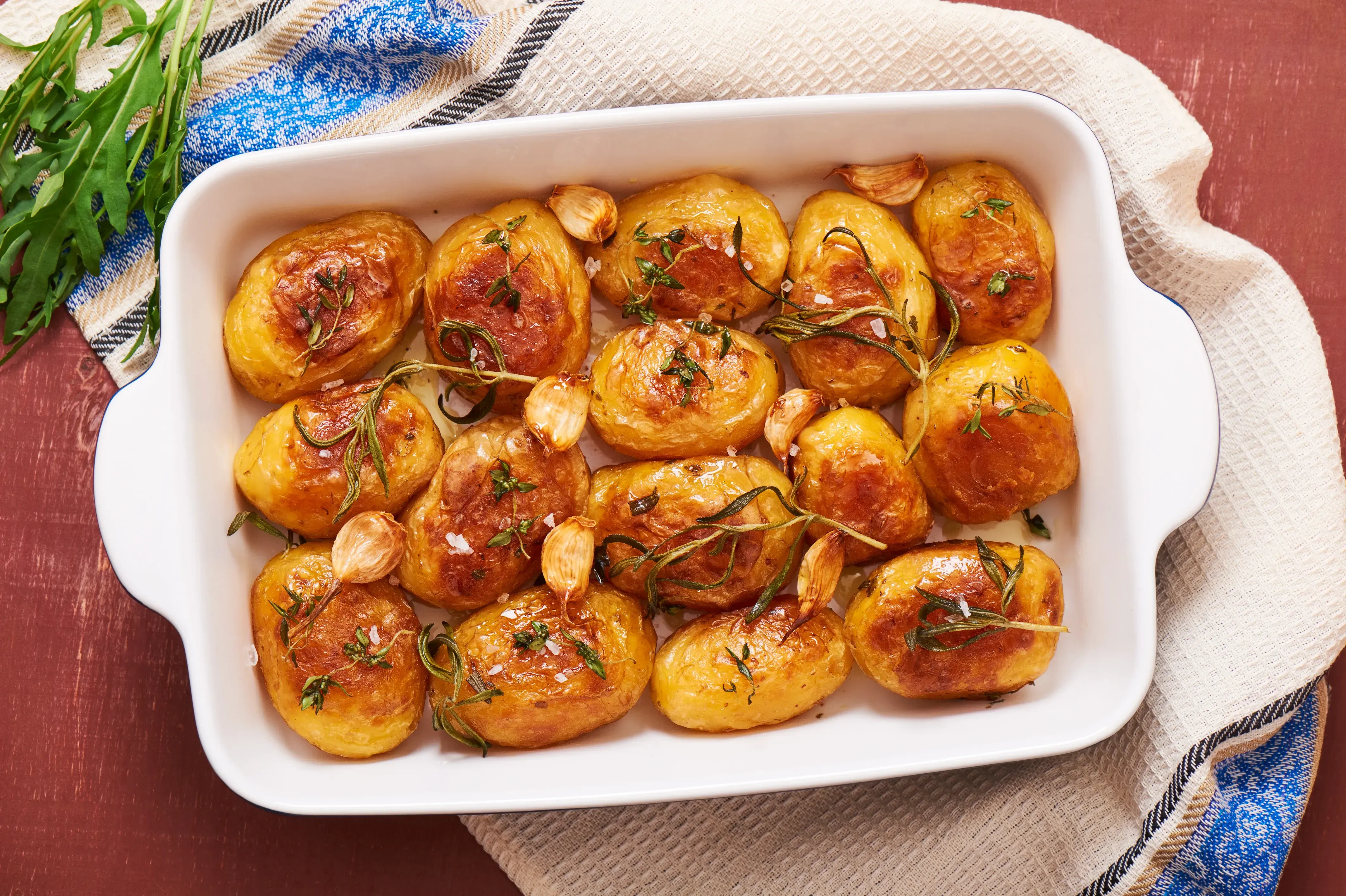 Piping hot tray of delicious roasted potatoes.