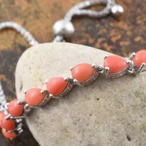 Oregon peach opal bracelet in sterling silver with platinum finish.