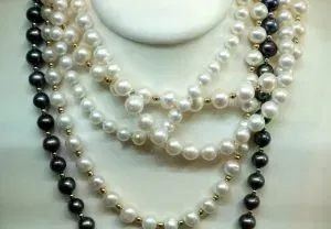 Pearl strands on bust.