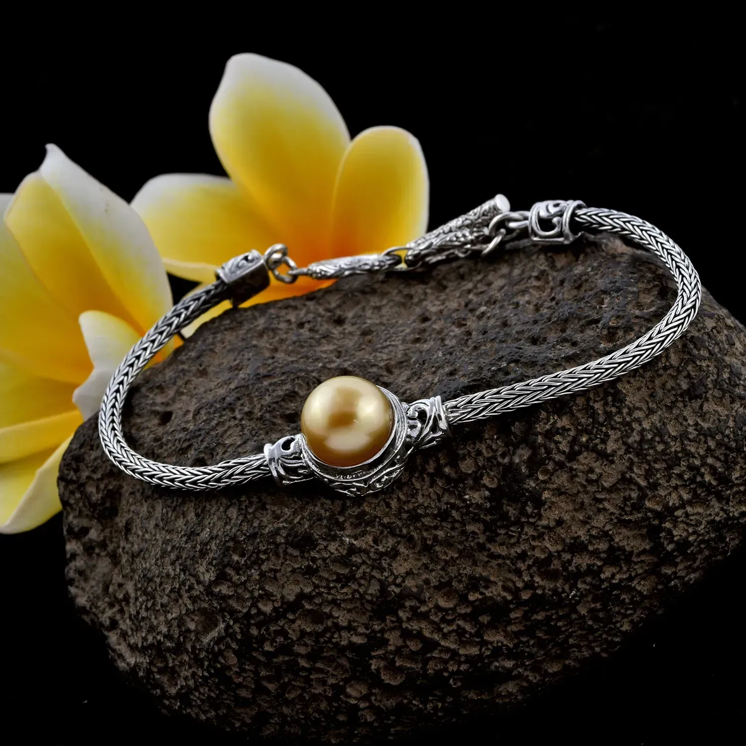 Bali silver bracelet featuring golden South Sea cultured pearl.