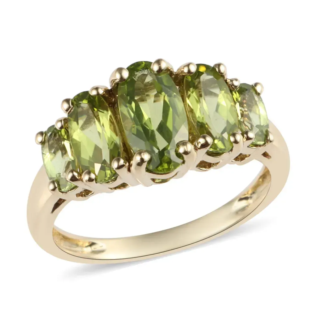 Peridot five stone ring in 10K yellow gold.