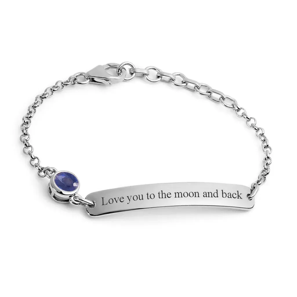 Bracelet inscribed with 'Love your to the moon and back'.