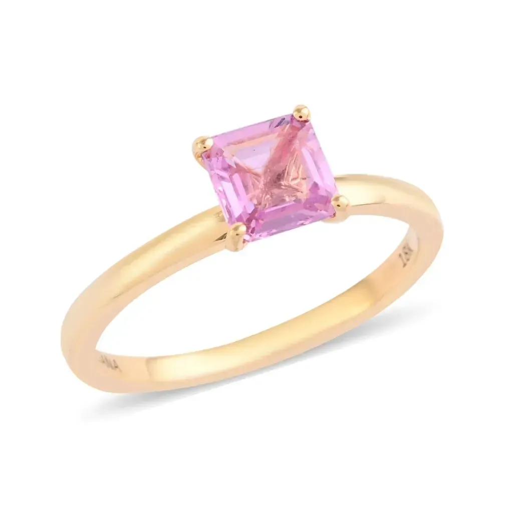Princess cut pink sapphire ring in 18K yellow gold.