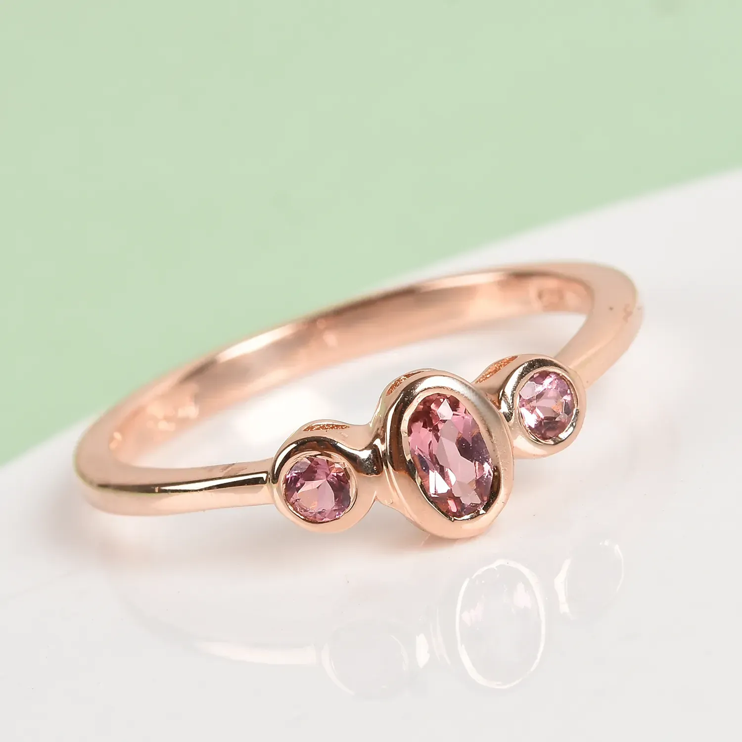 Pink three stone ring.