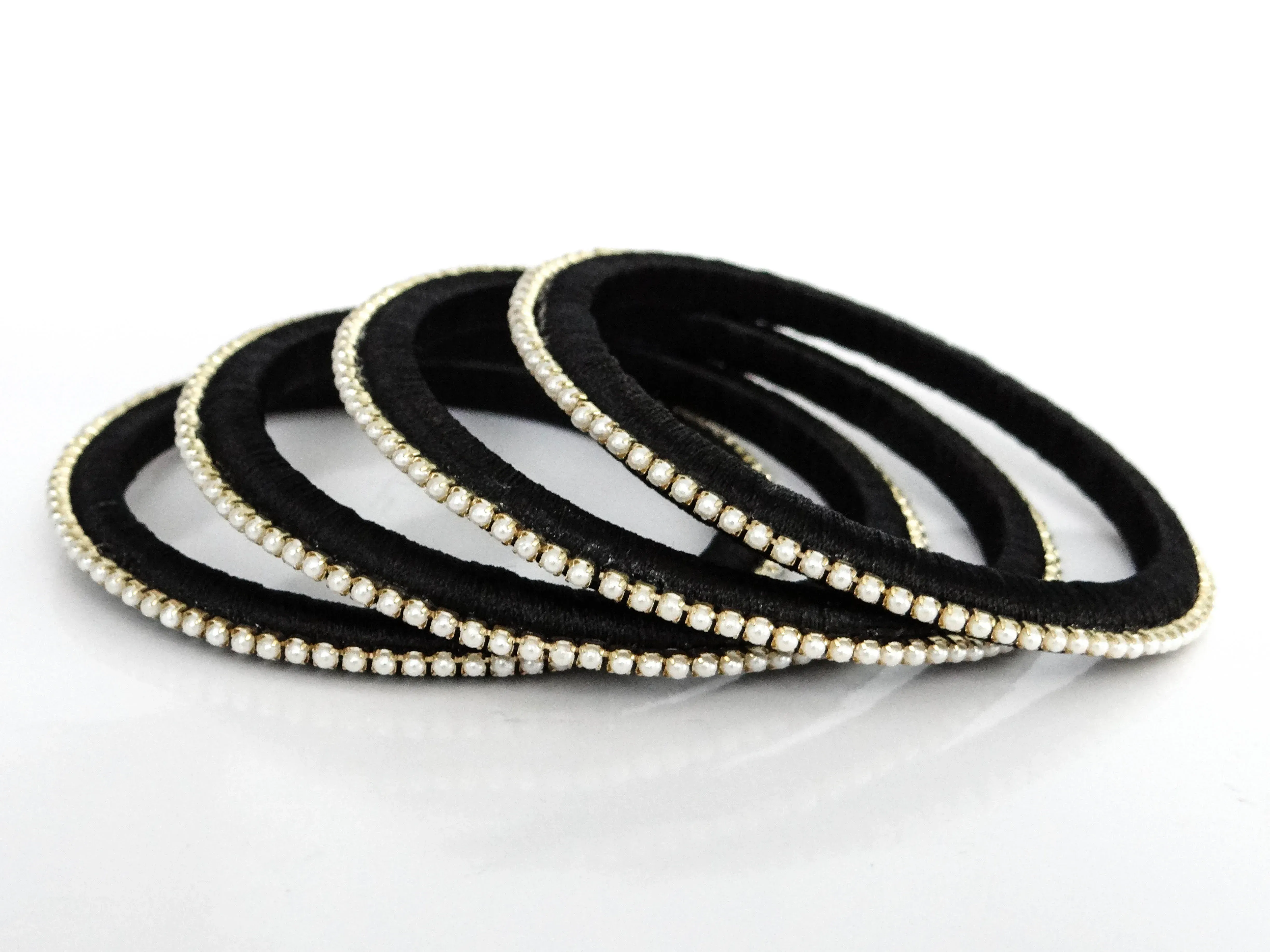 DIY bangles made from old prom jewelry.