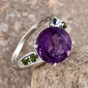 Purple fluorite statement ring in sterling silver with chrome diopside accents.