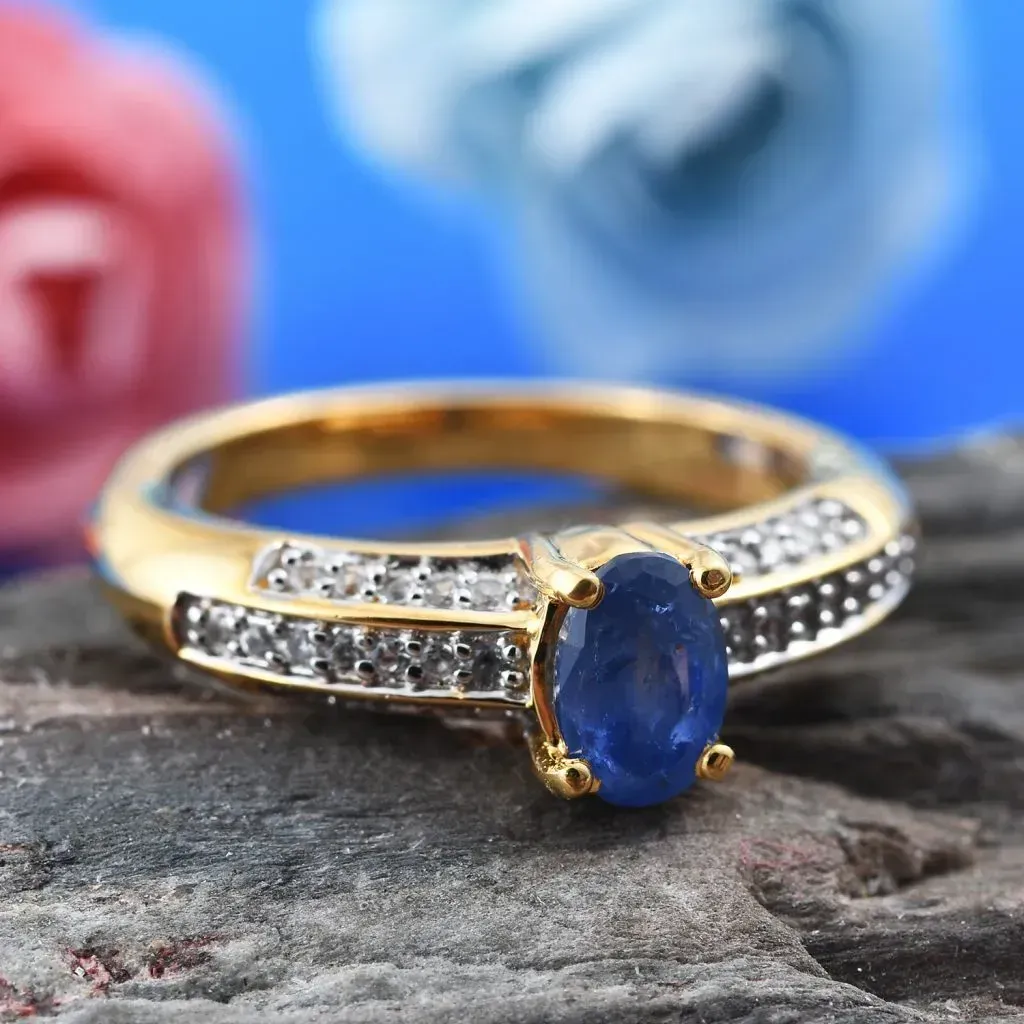 Burmese Sapphire ring in yellow gold on stone base. 