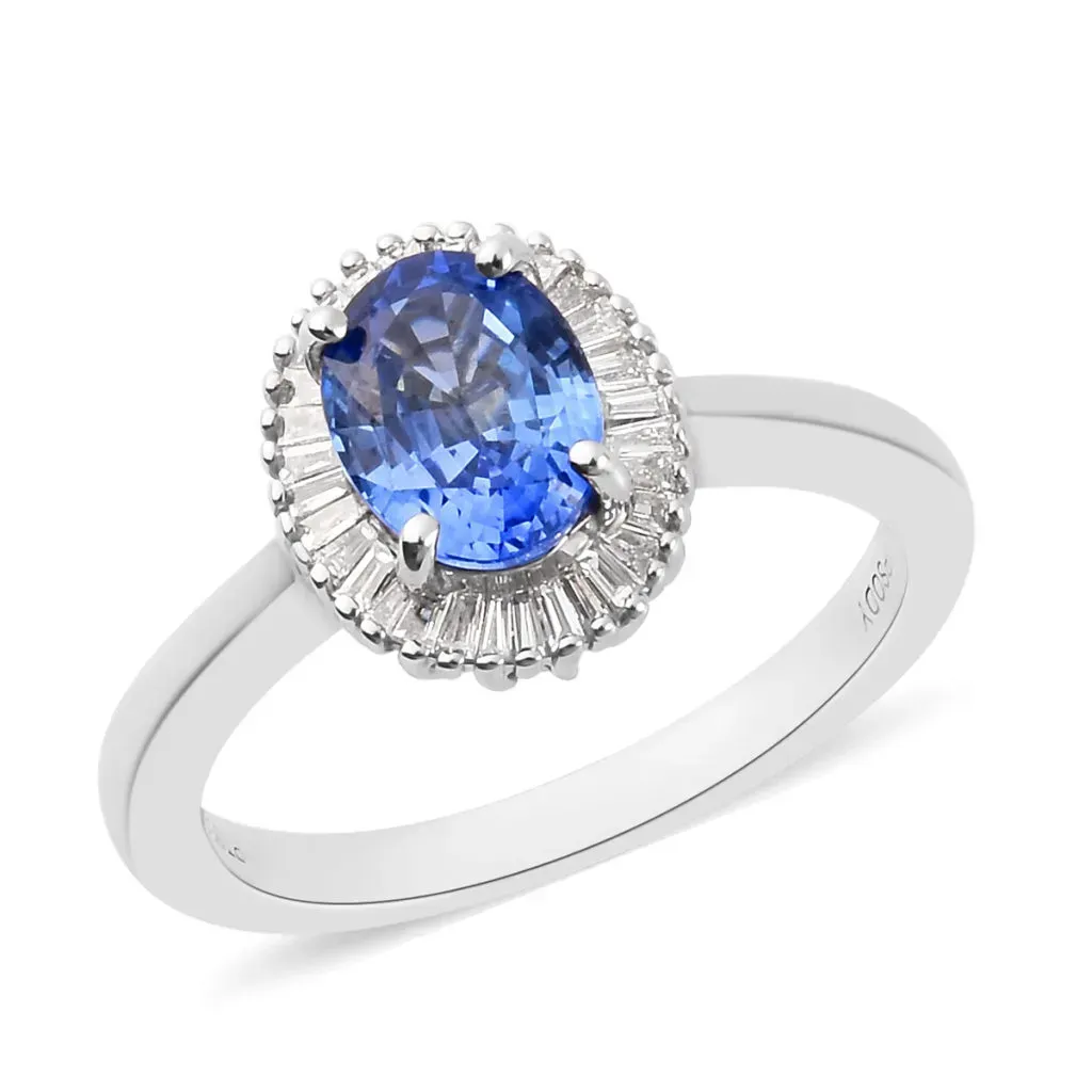 Blue sapphire halo ring in platinum.