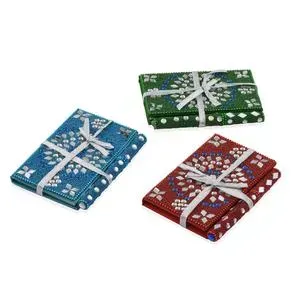 Set of bedazzled journals and pens. 
