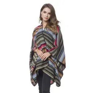 Woman wearing a striped shawl wrap. 