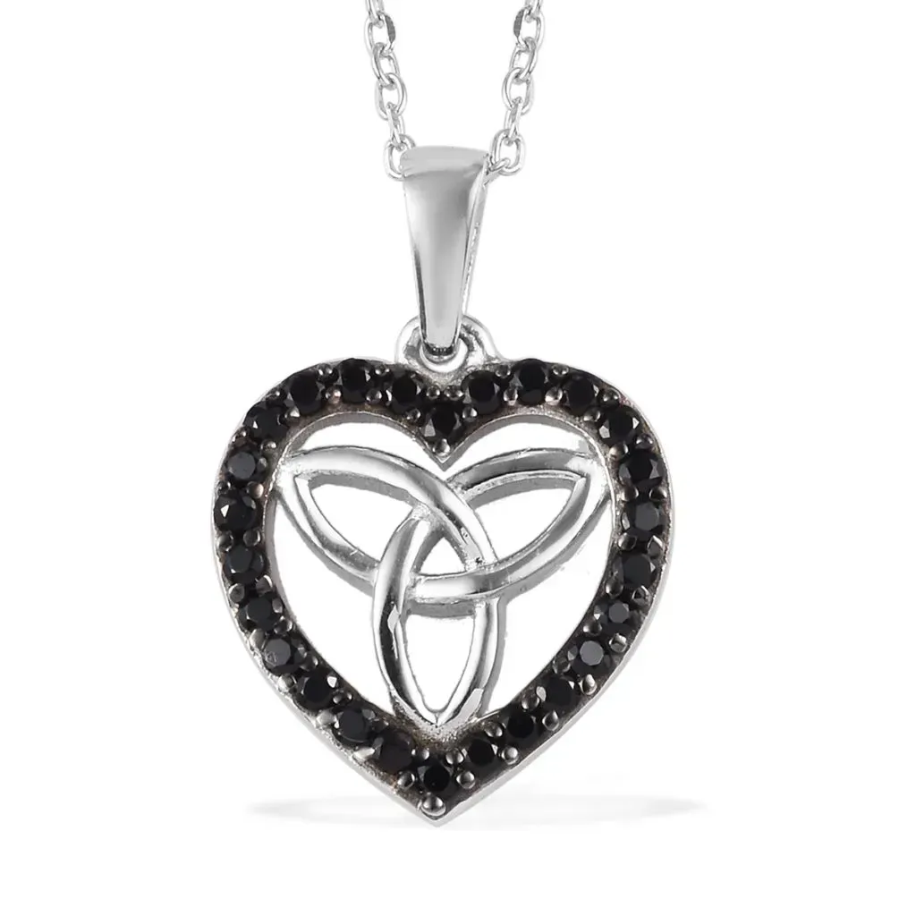Sterling silver Celtic knot pendant with black spinel accents. 