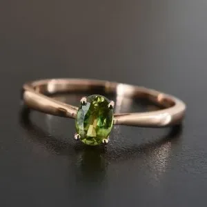 Sphene solitaire ring in sterling silver. 