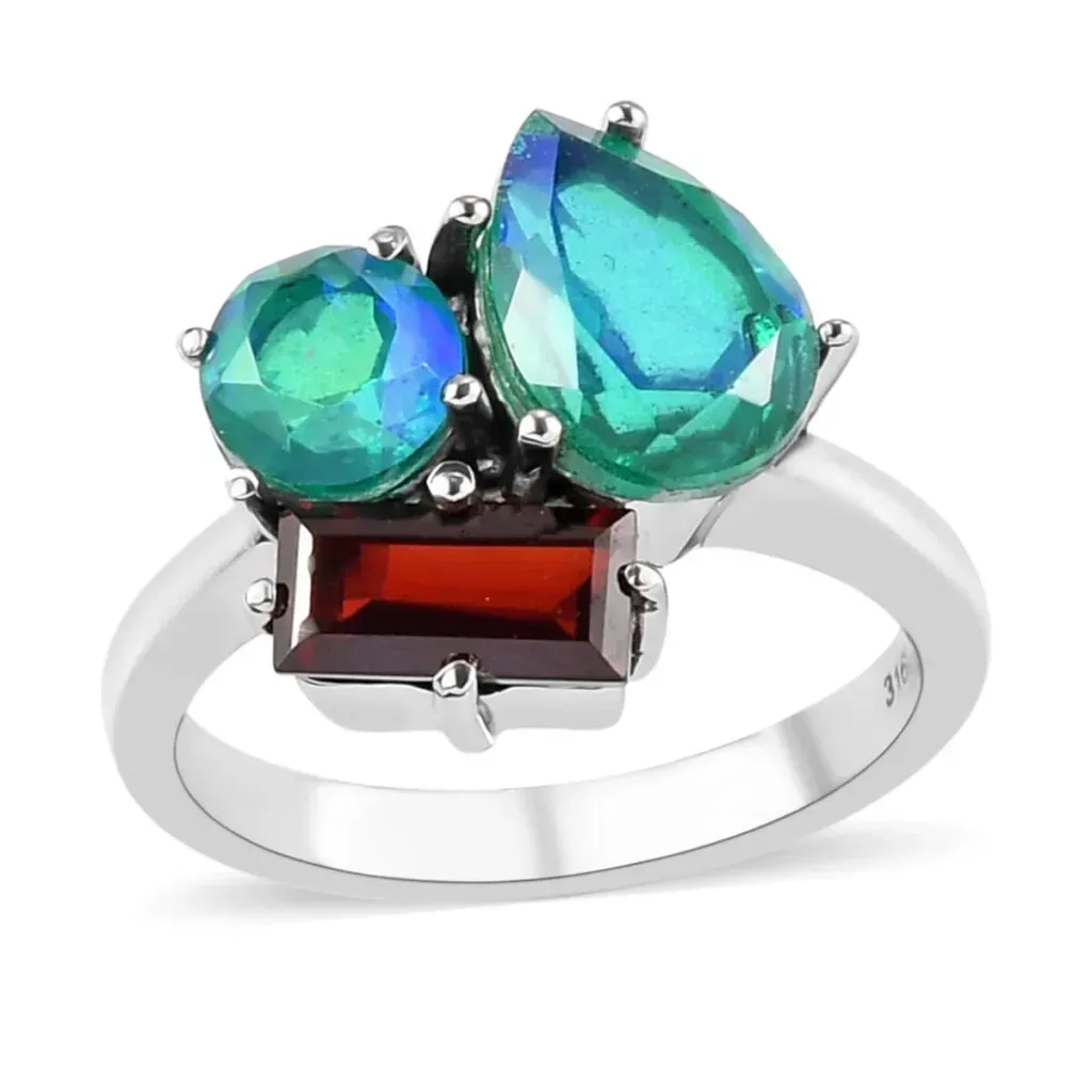 Peacock Quartz and garnet ring in stainless steel.