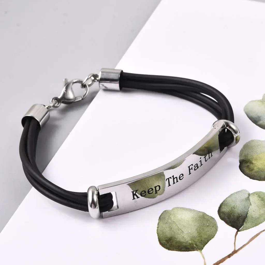 Silicone bracelet with stainless steel plate, engraved with "Keep The Faith."
