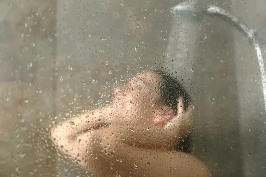 Woman showering. 