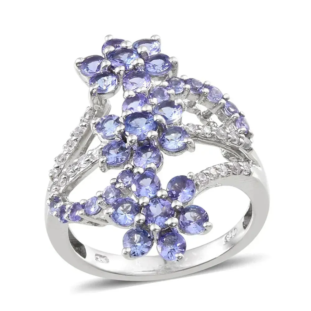 Floral ring with blue tanzanite in sterling silver. 