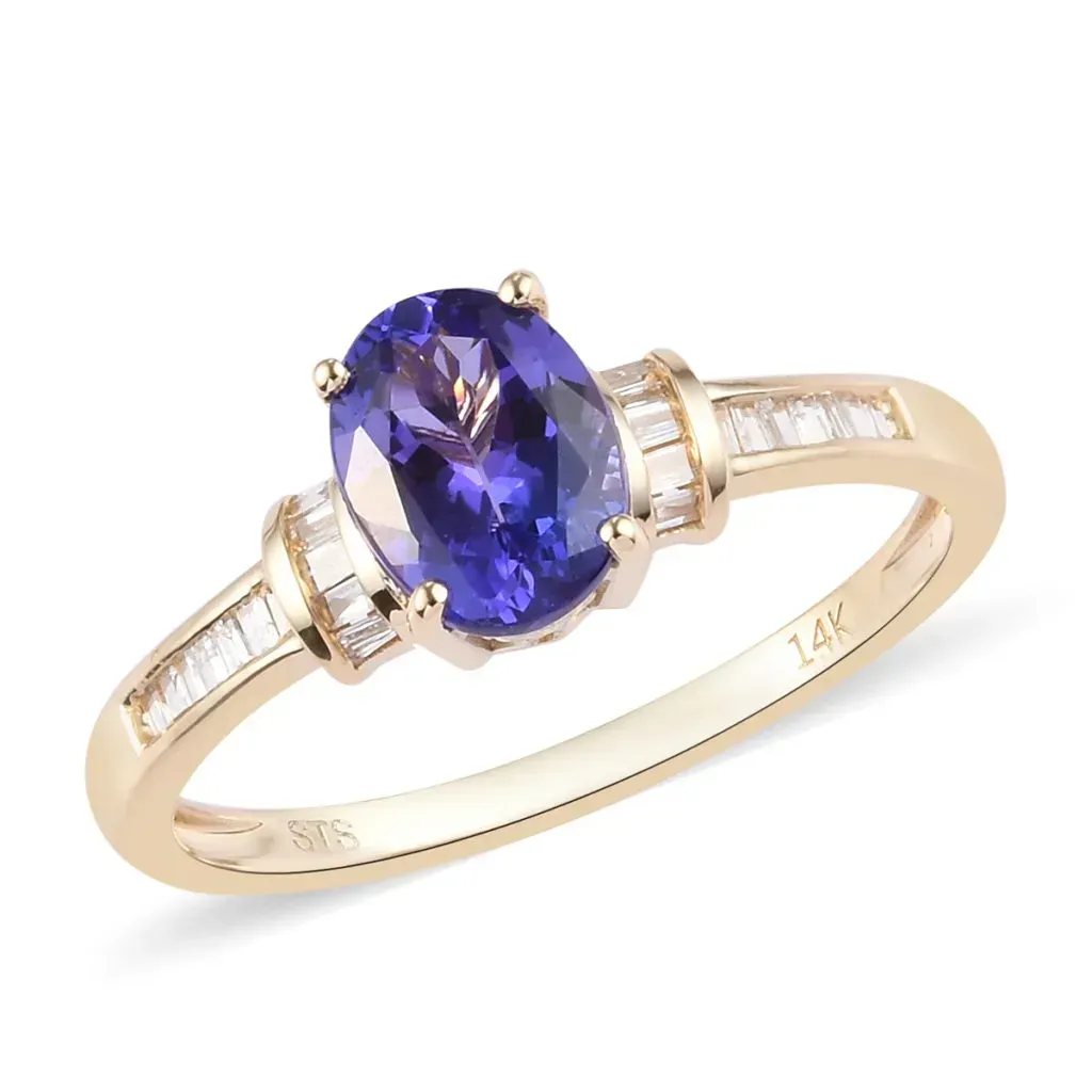 14K gold ring with blue gemstone.