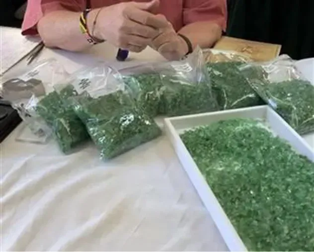 Sorting mint garnet stones. 