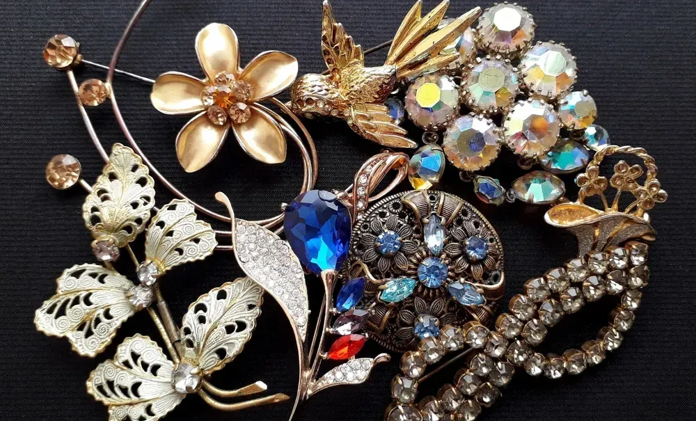 Assorted jewelry on black background. 