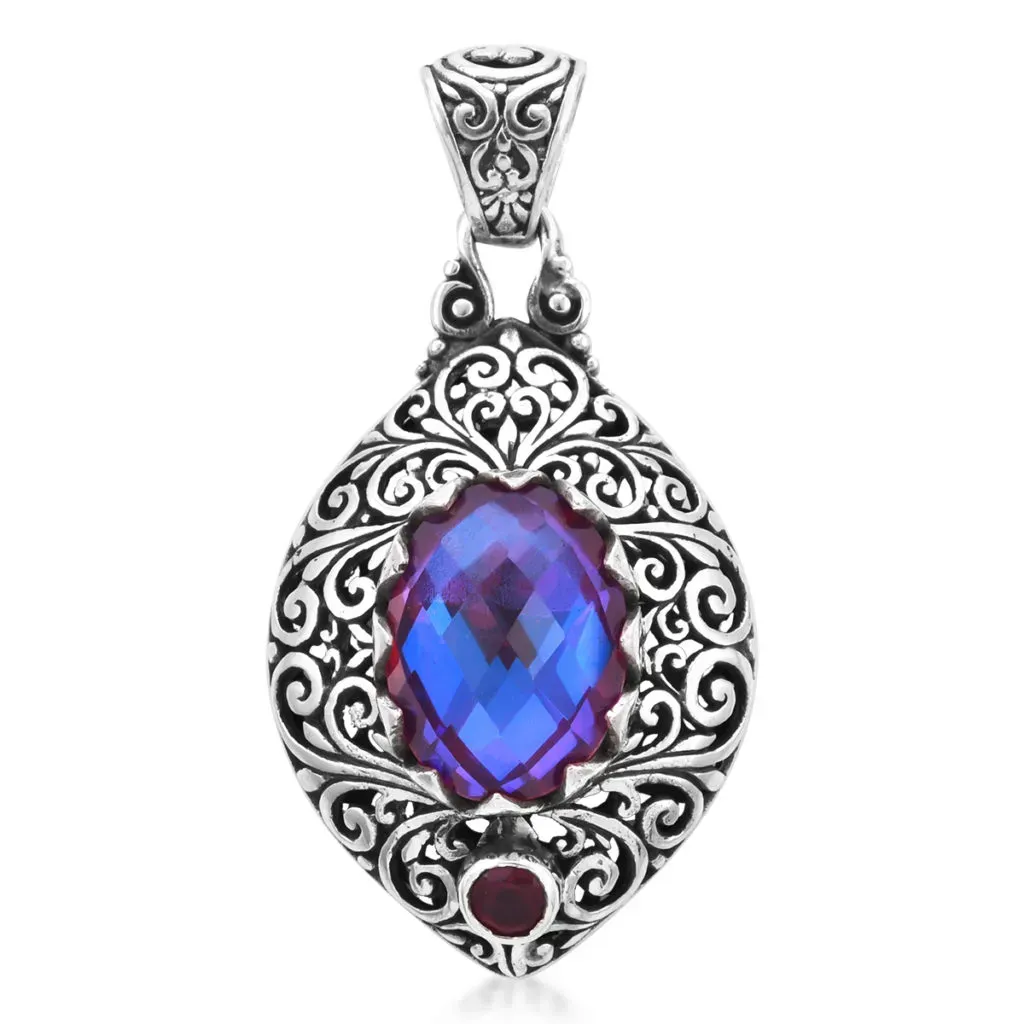 Volcanic Quartz pendant with filigree scroll work. 