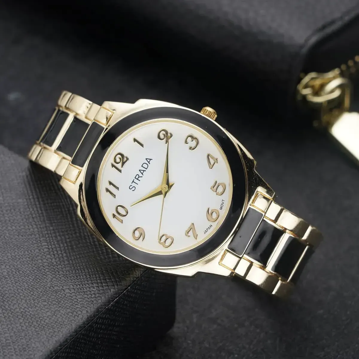 Strada Japanese Movement Watch with Black Enameled Stainless Steel Strap (35.80 mm) (6.50-7.50 Inches) on layered black background.