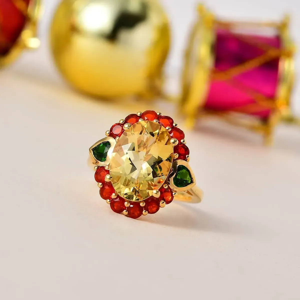 Yellow Labradorite and Multi Gemstone Halo Ring in Vermeil Yellow Gold Over Sterling Silver 6.35 ctw on light background. 